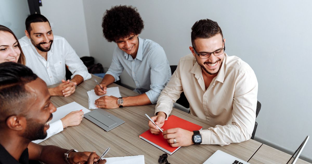 A team collaborating around a table in a modern office