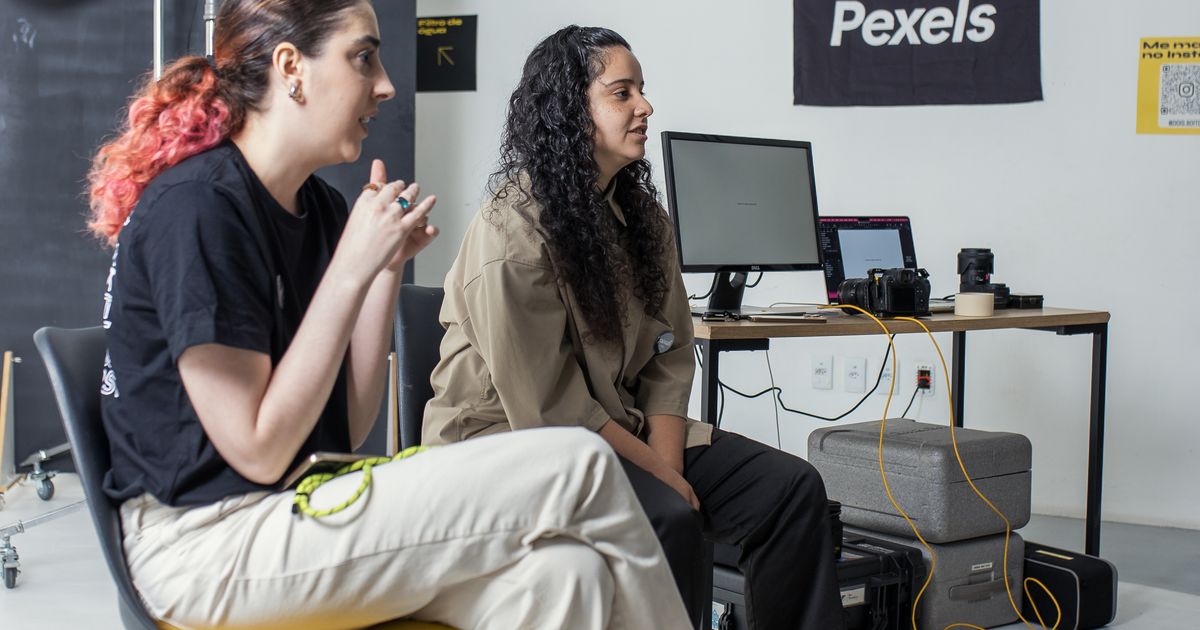 Creative professionals reviewing ideas together in a photography studio